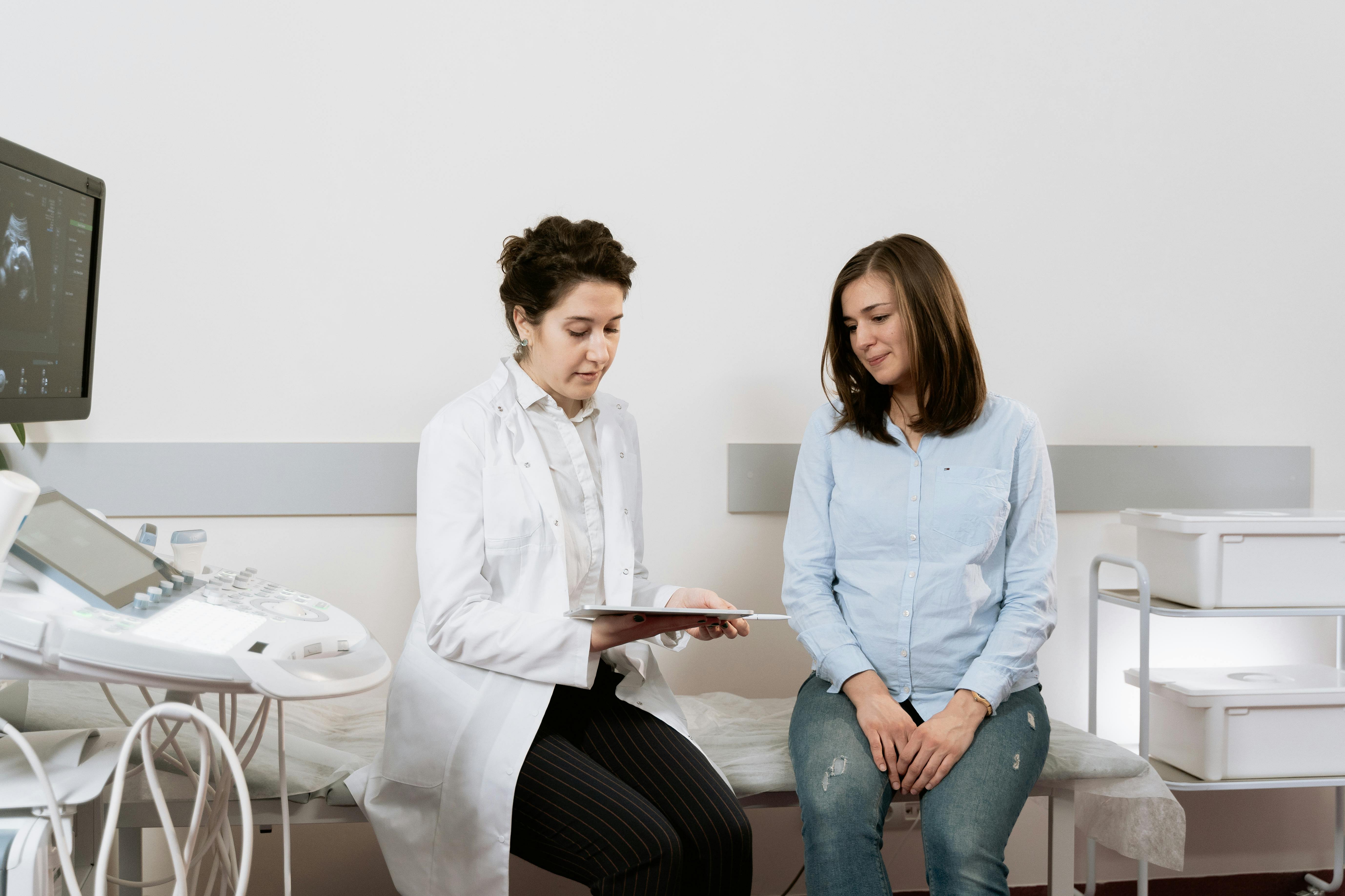 doctor and patient talking about clinical trials